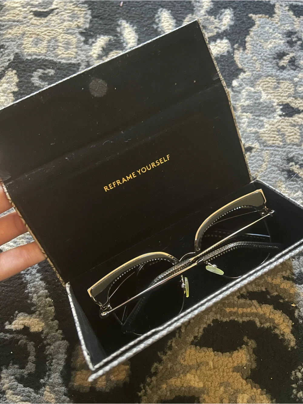 Gold Metal Frame Sunglasses, hatched dark lenses.